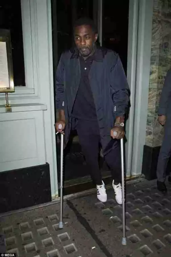 Actor Idris Elba Leaves A London Restaurant On Crutches After Breaking His Leg (Photos)